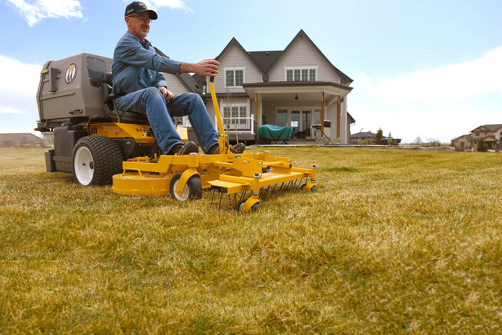 Zero turn lawn online mower dethatcher